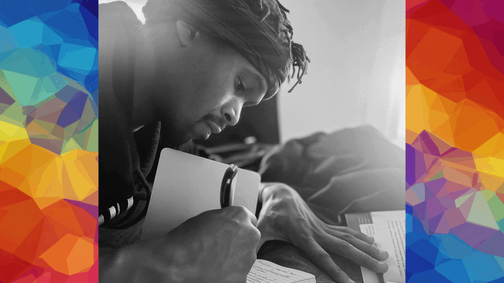 Ty Gant writing in a journal