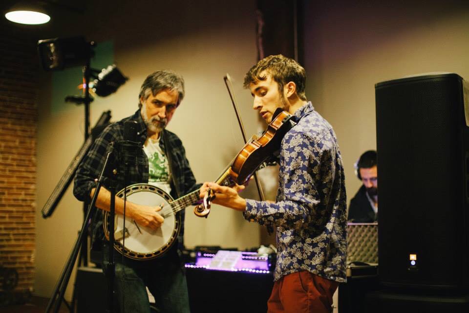 Mark and Jordan Rast perform banjo and violin in a recording studio
